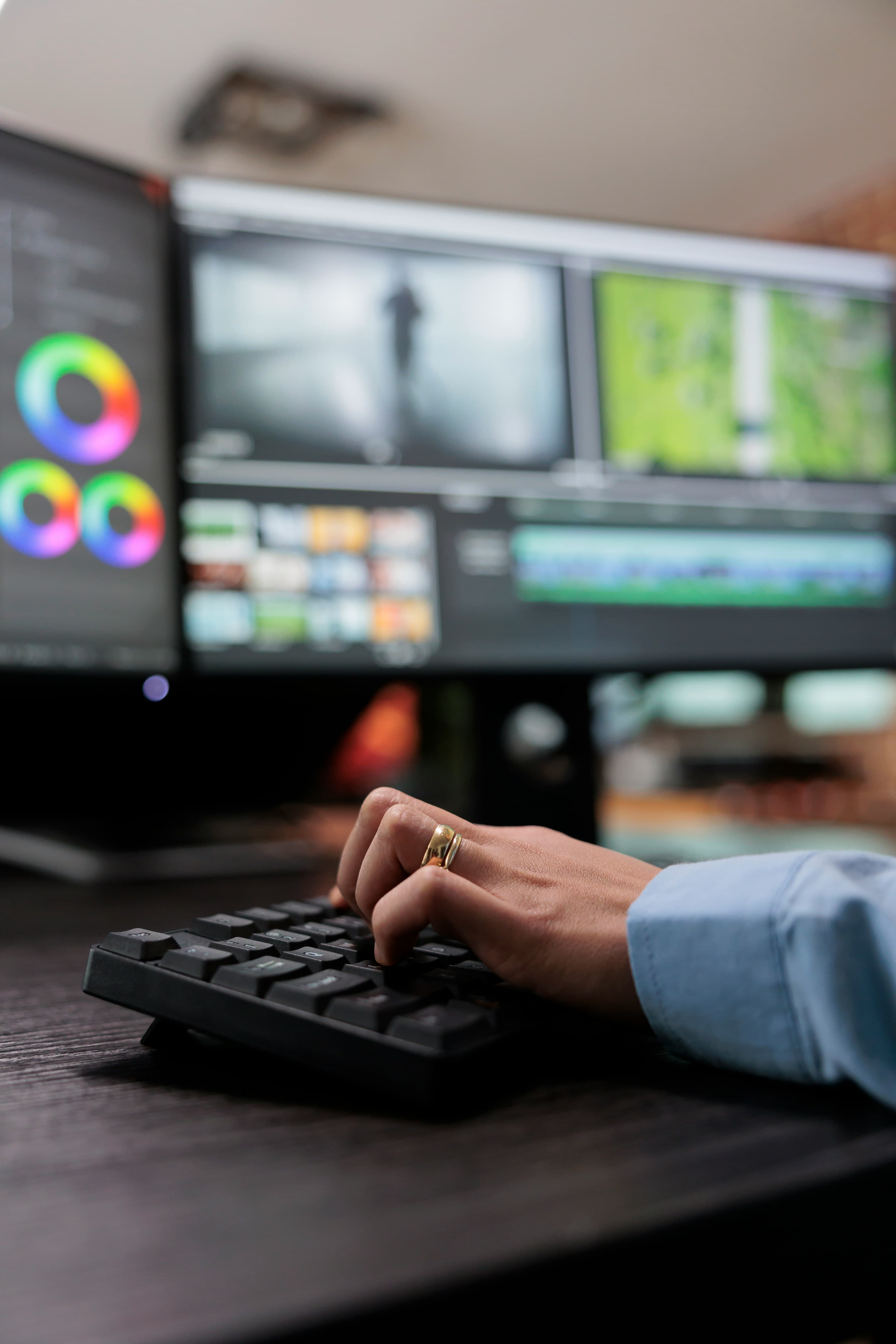 Color grading station with editor adjusting timeline.