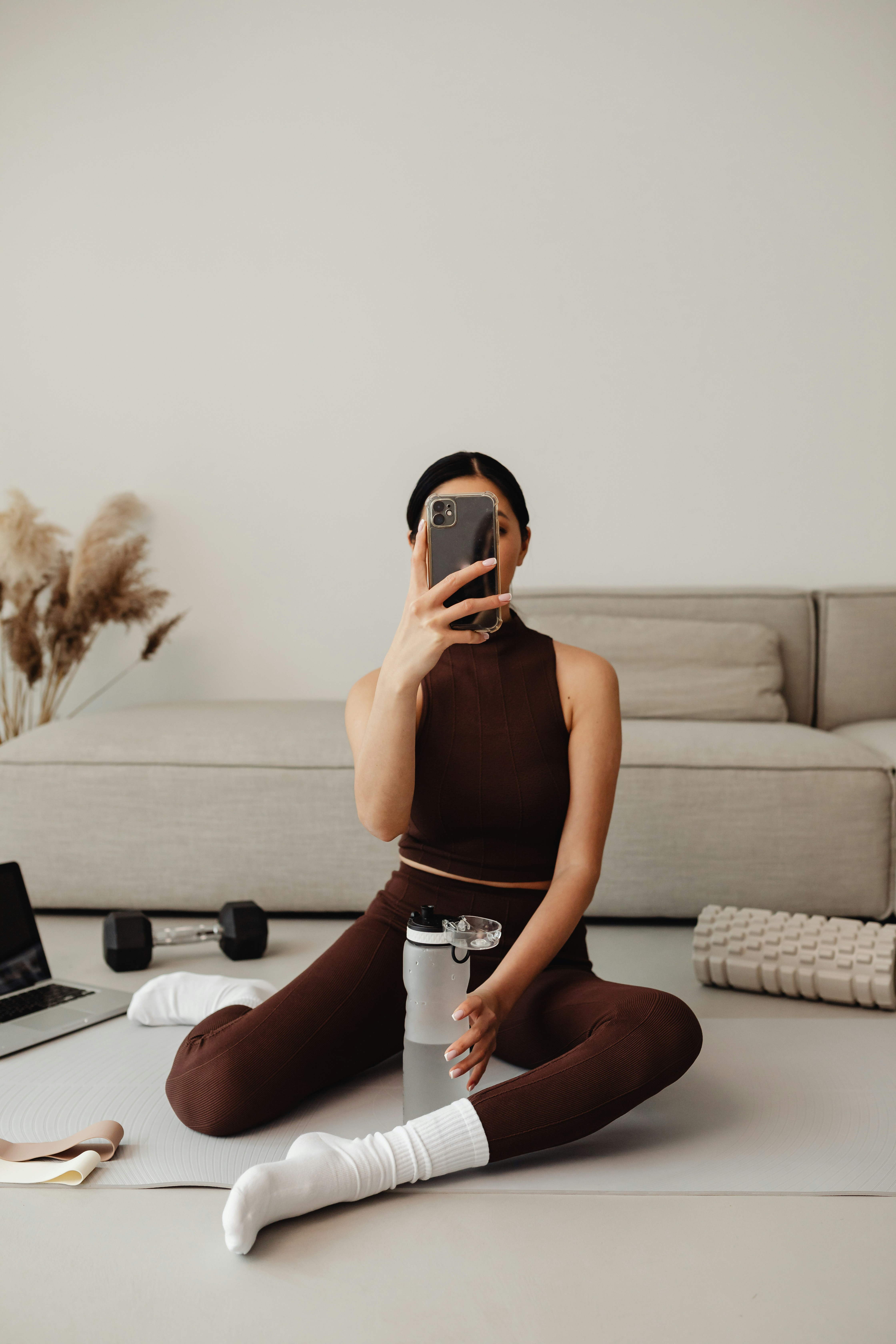 Athlete capturing a vertical social piece in a fitness lifestyle setup.