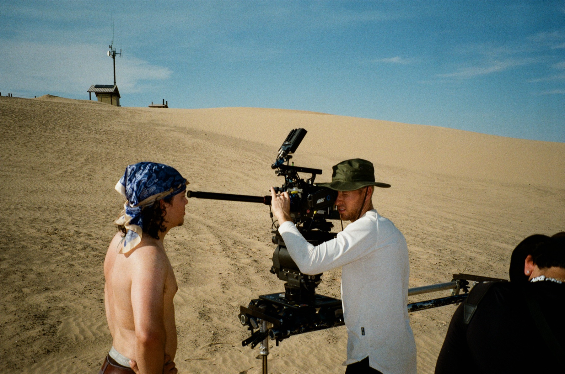 Director of photography operating a slider on a desert shoot