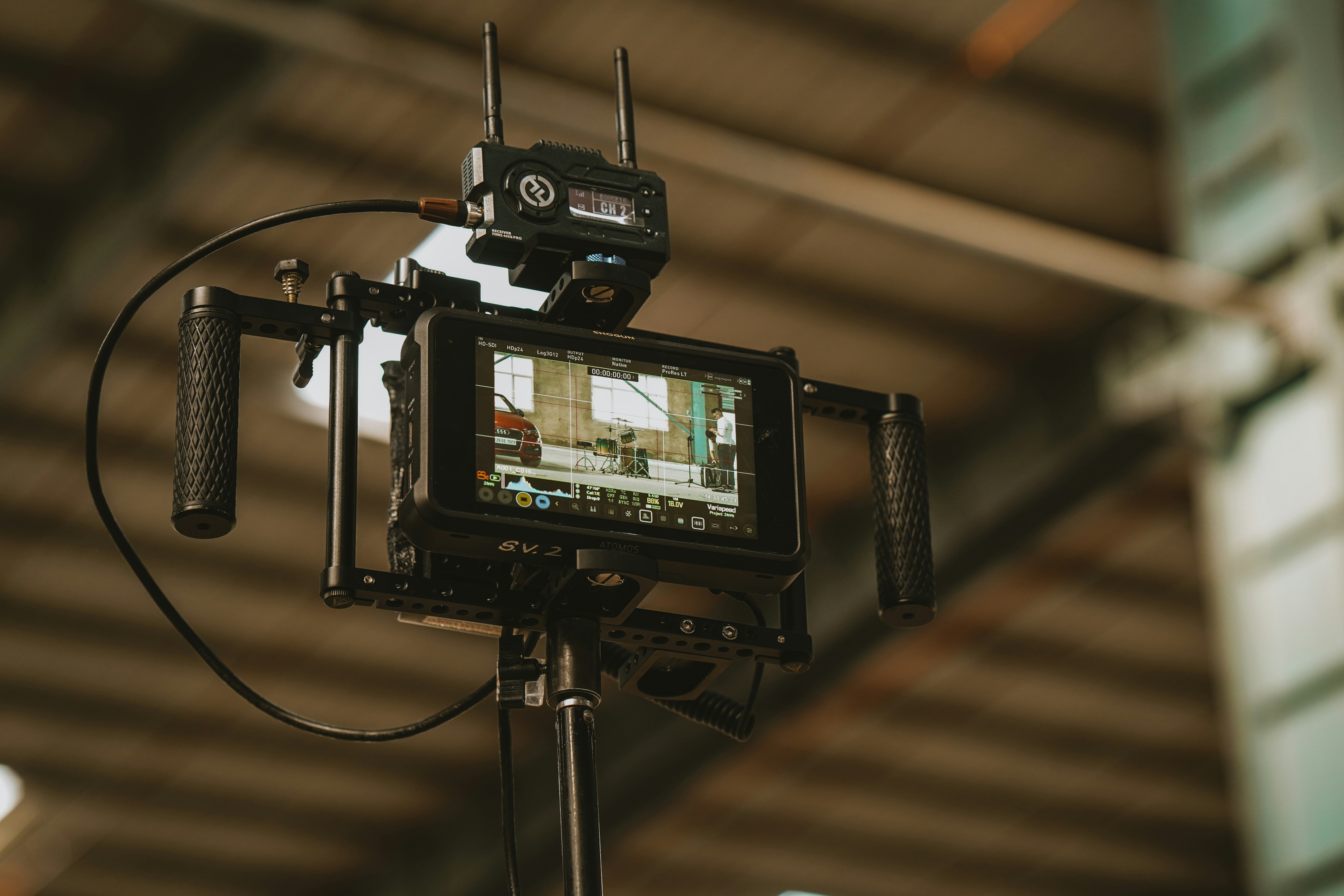 Wireless transmitter on top of a director monitor mid-take.
