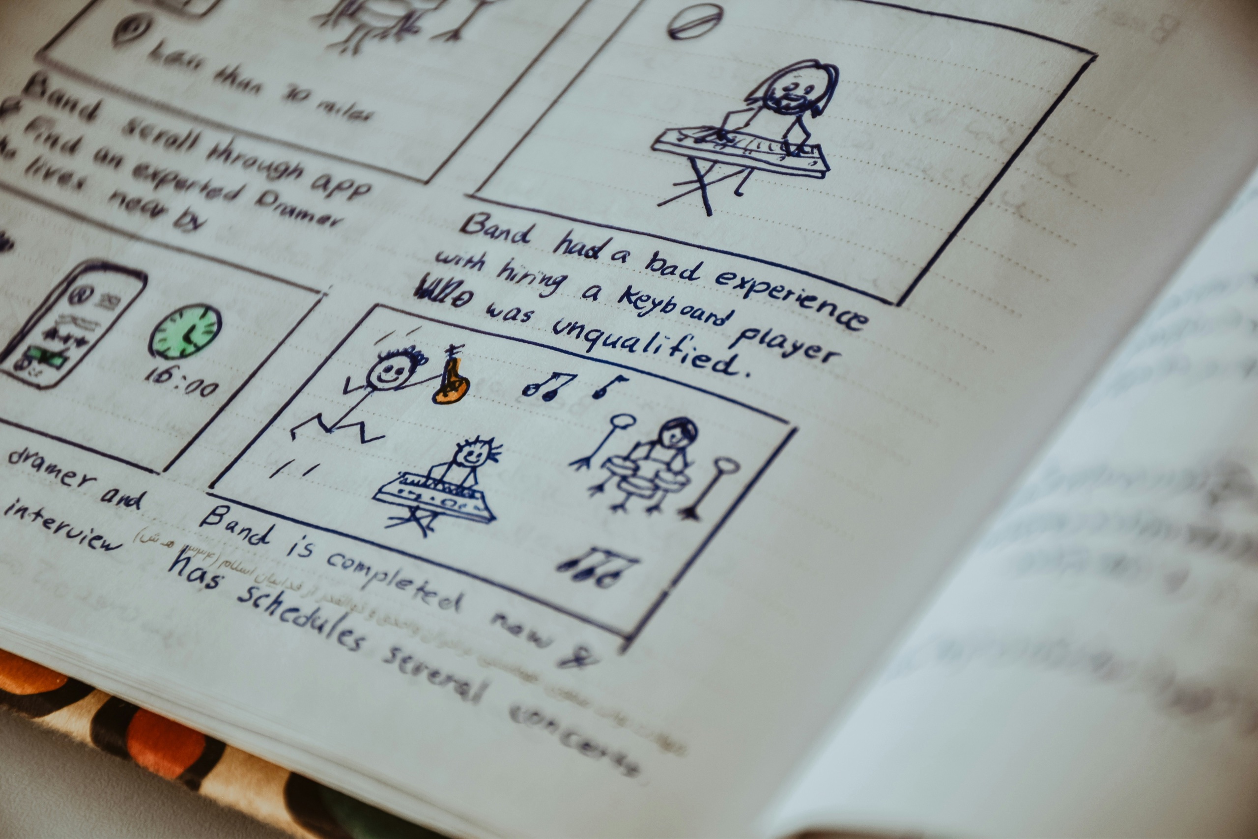 Storyboard sketches in a notebook, pre-production planning